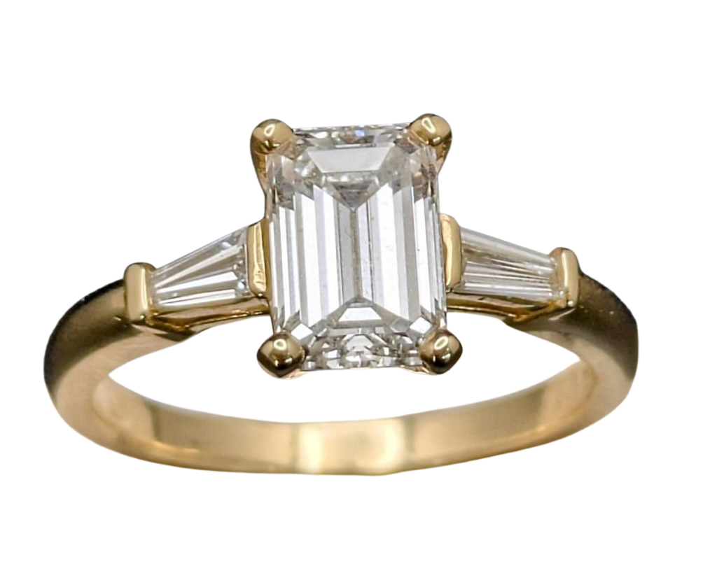 1.50 Emerald Cut Diamond Ring With Baguette Accent Diamonds - Yellow Gold
