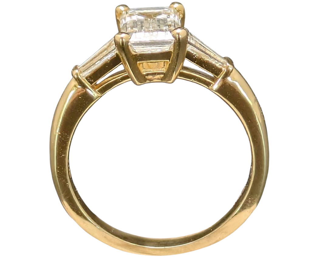 1.50 Emerald Cut Diamond Ring With Baguette Accent Diamonds - Yellow Gold