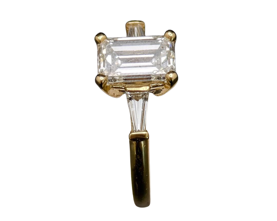 1.50 Emerald Cut Diamond Ring With Baguette Accent Diamonds - Yellow Gold