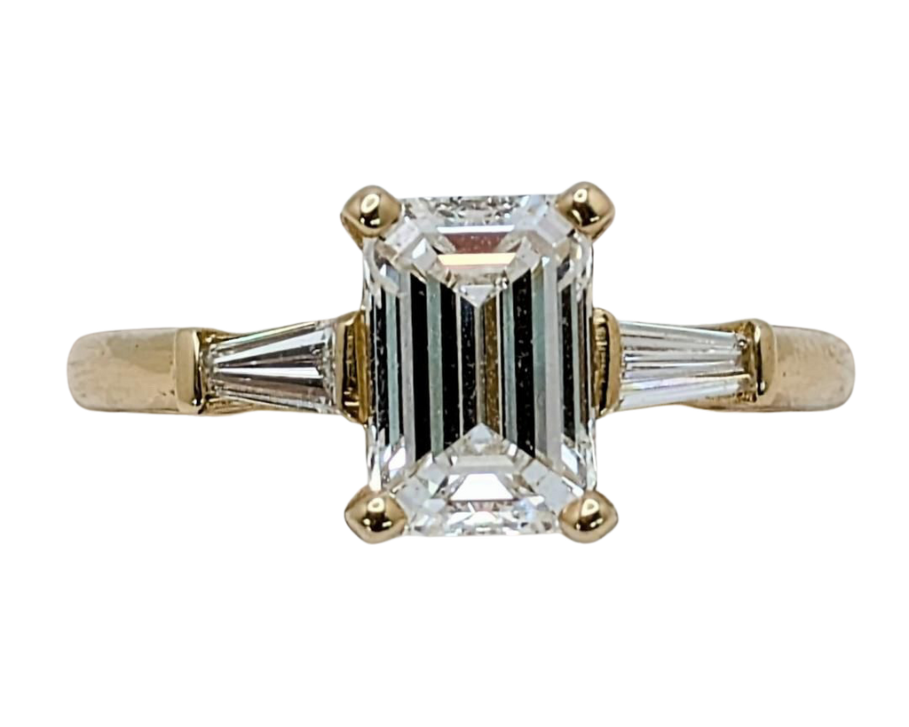 1.50 Emerald Cut Diamond Ring With Baguette Accent Diamonds - Yellow Gold