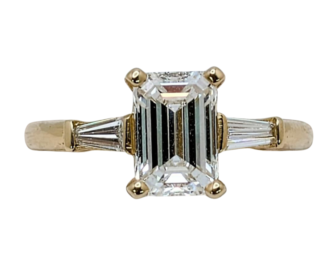 1.50 Emerald Cut Diamond Ring With Baguette Accent Diamonds - Yellow Gold