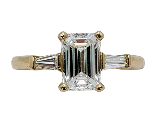 1.50 Emerald Cut Diamond Ring With Baguette Accent Diamonds - Yellow Gold