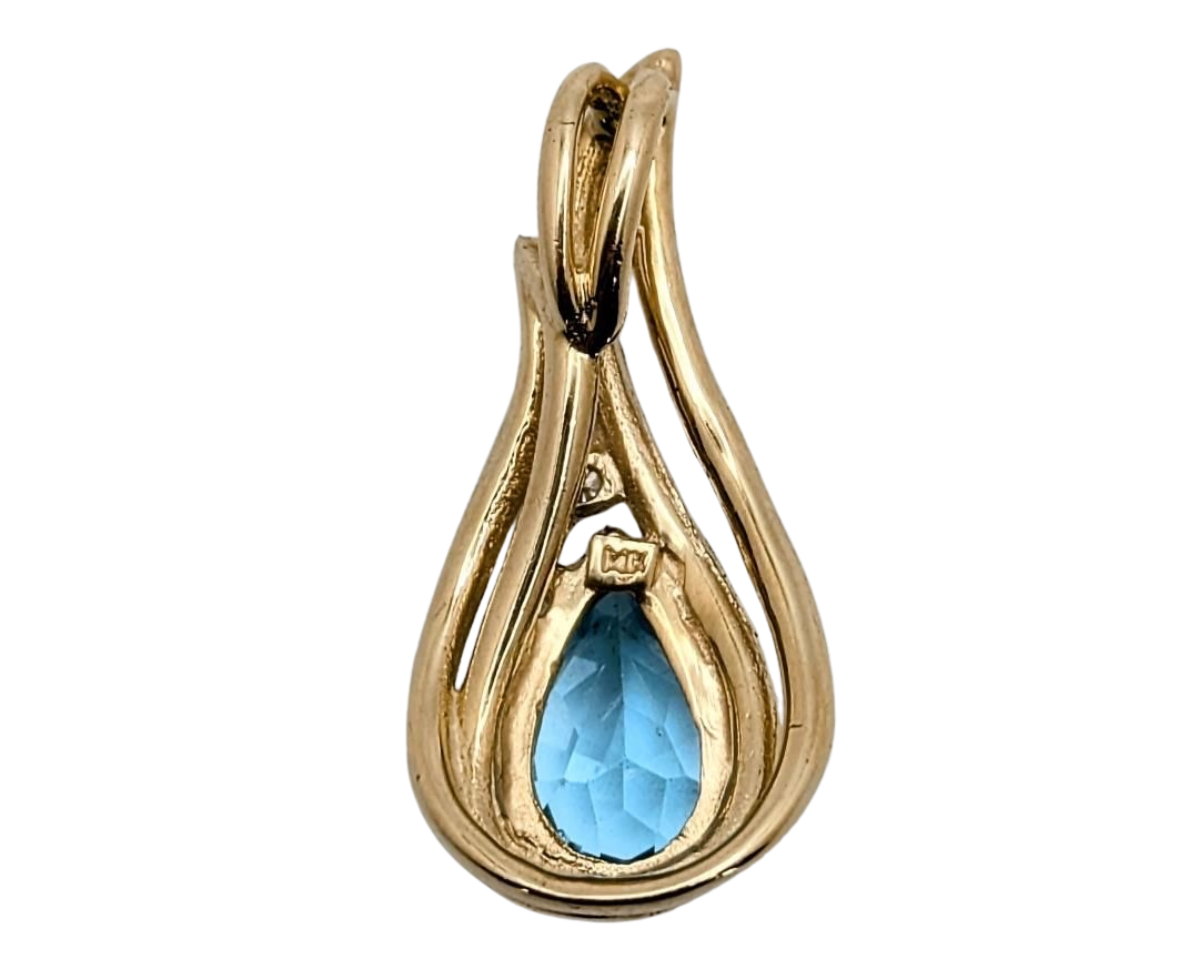 Blue Topaz Flame Design Pendant - Yellow Gold