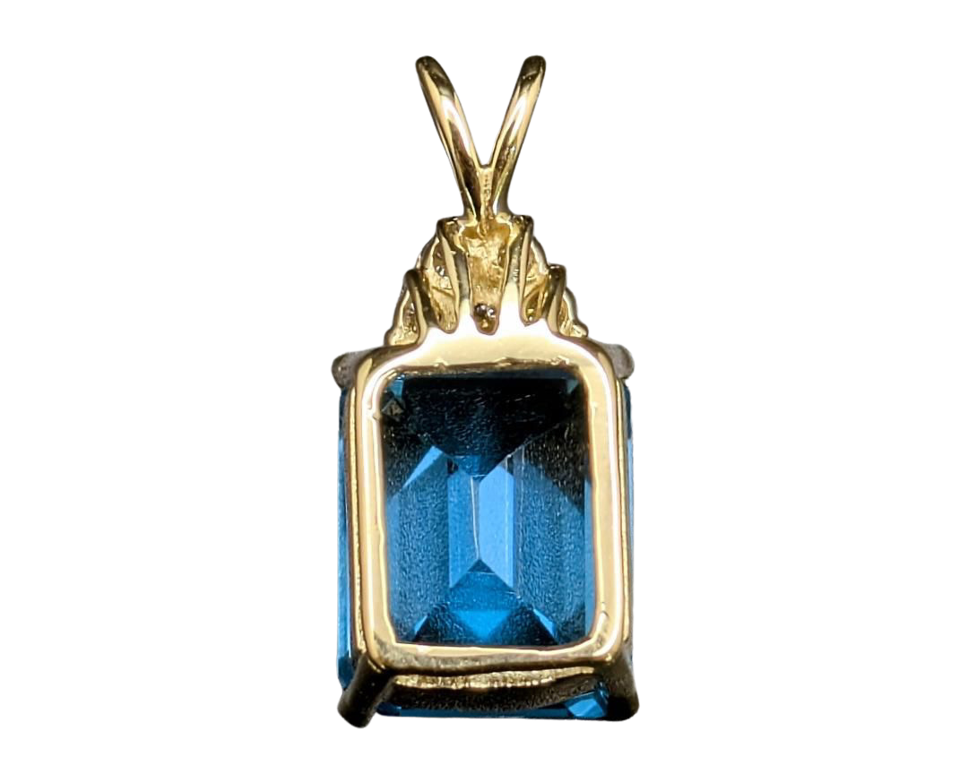Emerald Cut Blue Topaz Pendant with Diamond Accents - Yellow Gold
