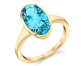 Blue Topaz Oval Solitaire Ring - Yellow Gold
