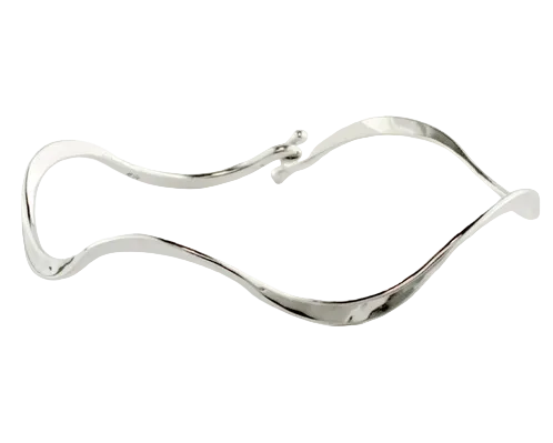 A polished silver cuff bracelet with a wavy, fluid organic shape and a small decorative clasp, shown on a plain white background.