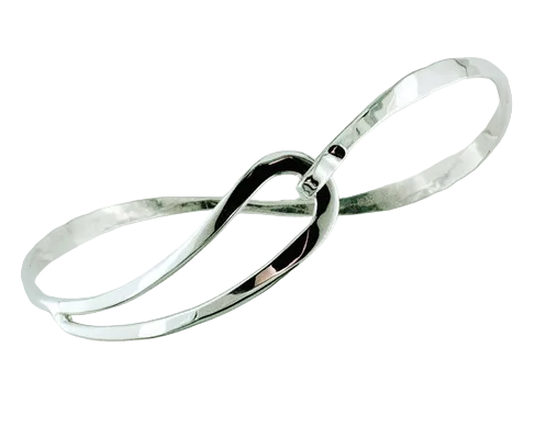 A polished silver organic-style bangle bracelet with a smooth, reflective finish, shown on a plain white background.